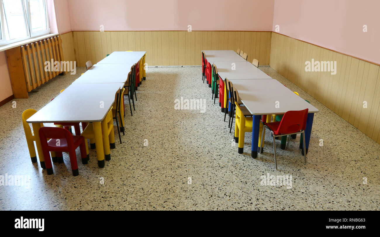 Large Nursery Room Used As A Refectory With Tables And Small Chairs Without Children Stock Photo Alamy