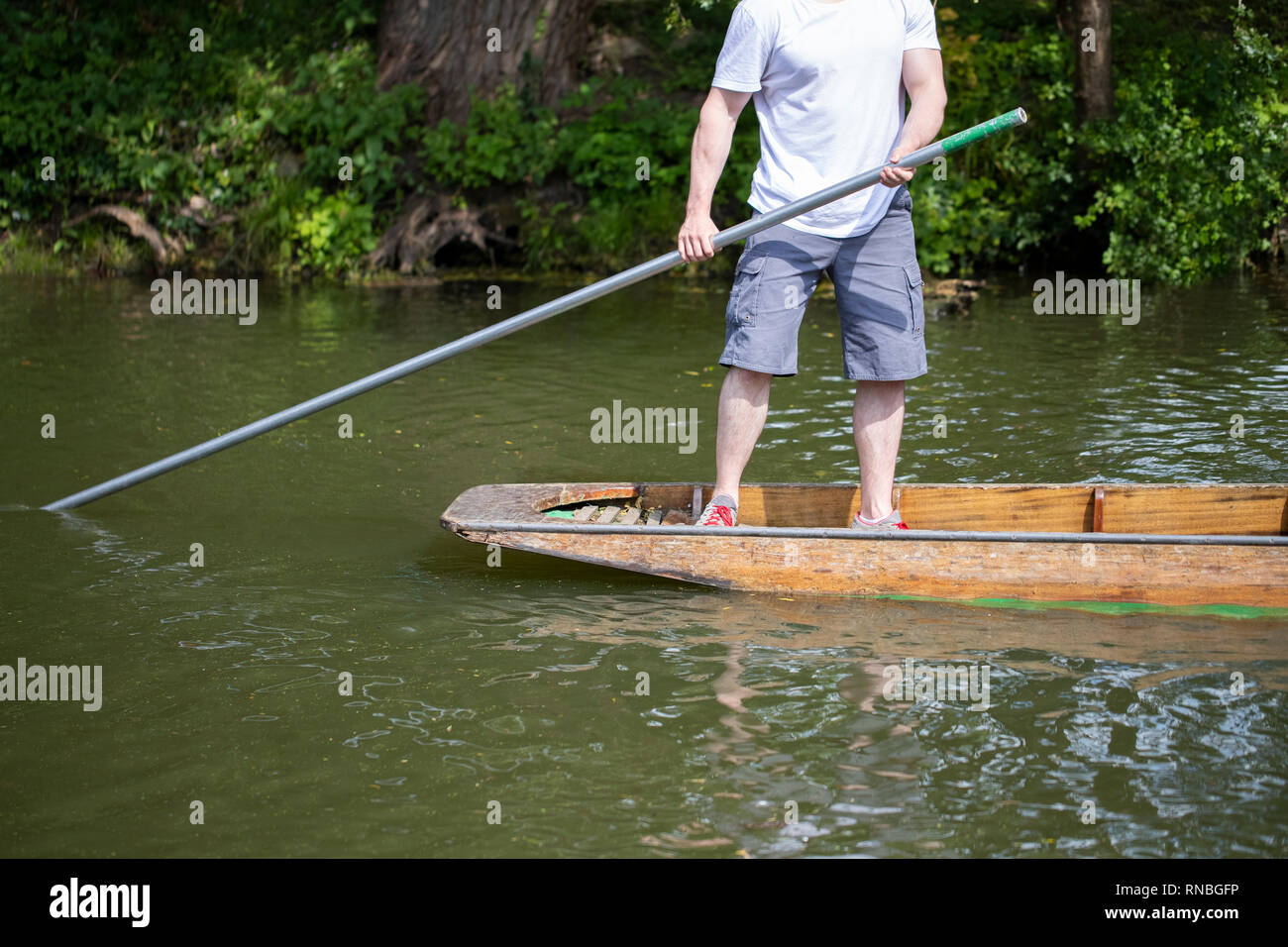Detail Of Man In Punt On River Cherwell In Oxford Stock Photo