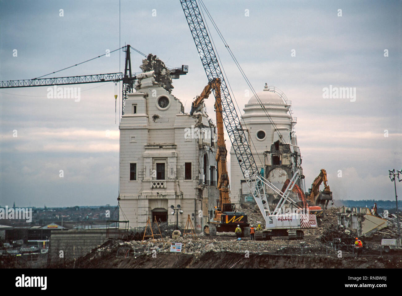 The iconic twin towers of Wembley Stadium in London, England, being demolished in 2003. Stock Photo
