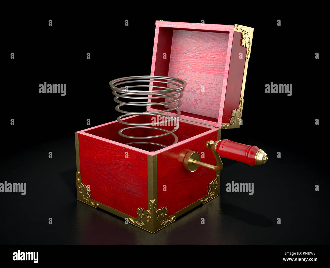 An antique open jack-in-the-box mad of red wood and gold trimmings with an unattached spring  - 3D render Stock Photo