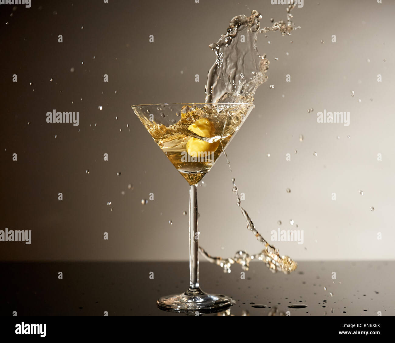 Dirty martini with olive Stock Photo