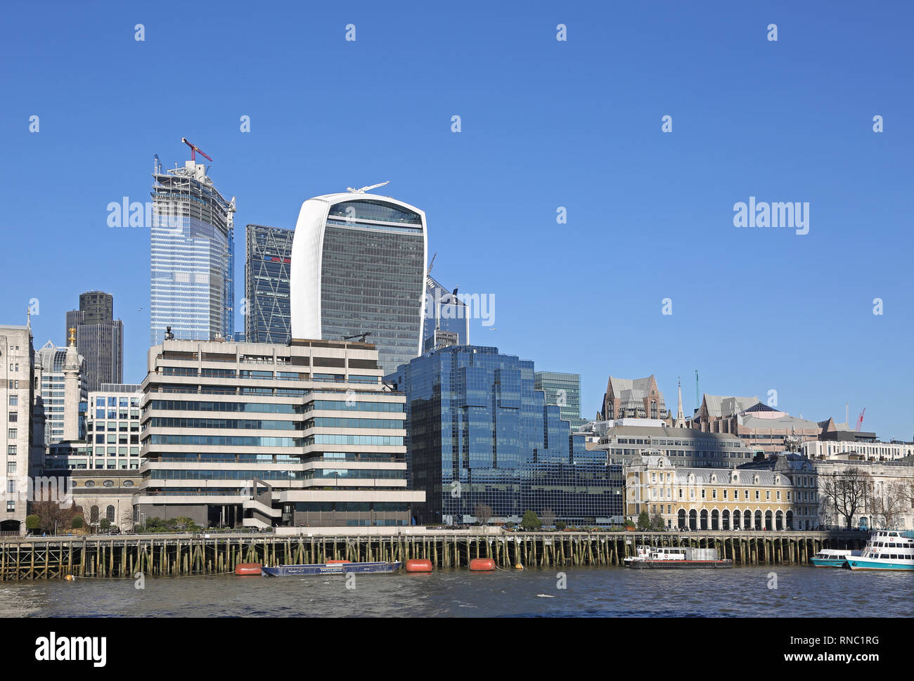 London city skyline from the south bank of the River Thames. Shows the 'Walkie-Talkie' centre, ld Billingsgate fis]h market to the right. Stock Photo