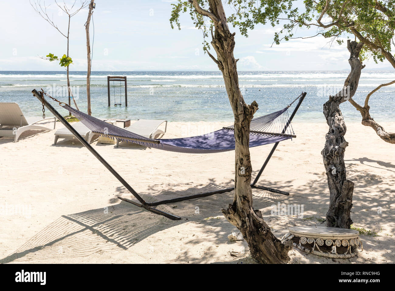 Swing on tropical beach in indonesia Gili Trawangan. Stock Photo