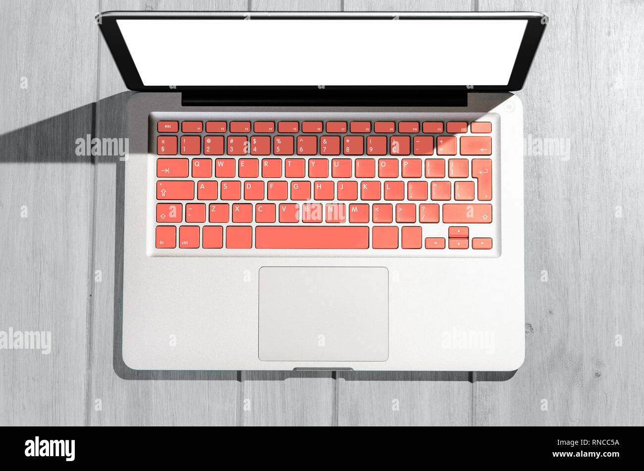 Laptop on wooden table Stock Photo