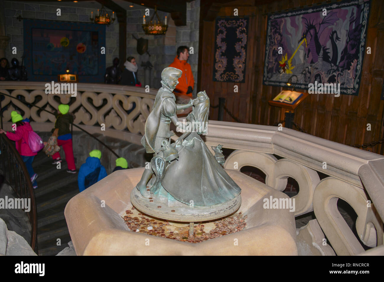 FRANCE, PARIS - February 28, 2016 - Once upon a time ... Statue of Princess Aurora and Prince Philip made in bronze, inside the castle Disneyland Stock Photo