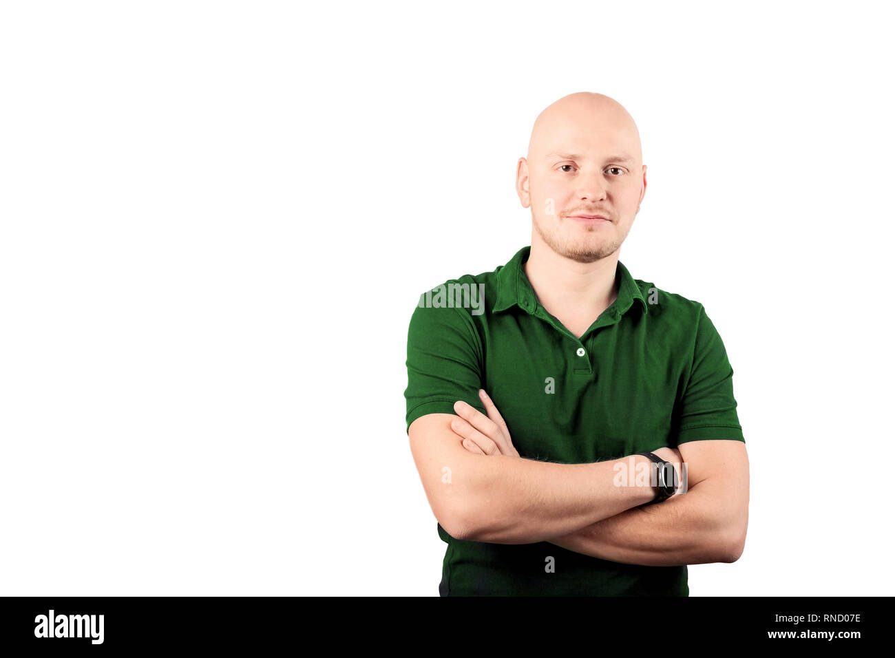 Young adult looking at camera with smiling and proud expression Stock Photo