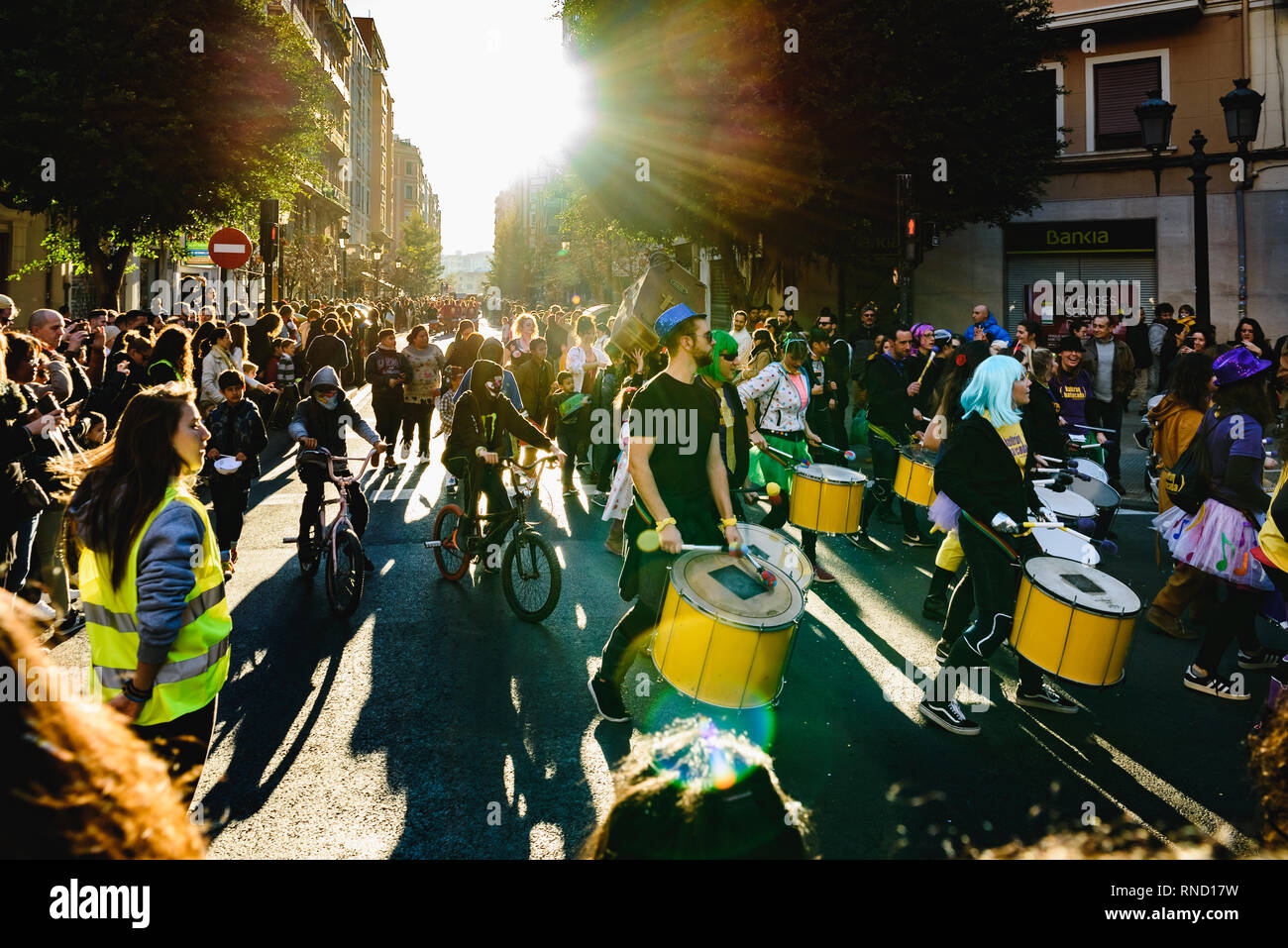 Valencia, Spain - February 16, 2019: Group of drummers of a Spanish batukada making their drums boom through the streets of the Ruzafa district during Stock Photo