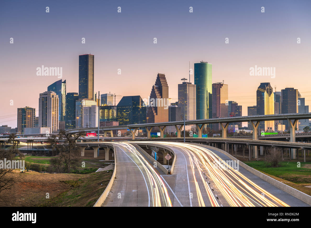 Houston, Texas, USA downtown city skyline and highway at dusk Stock
