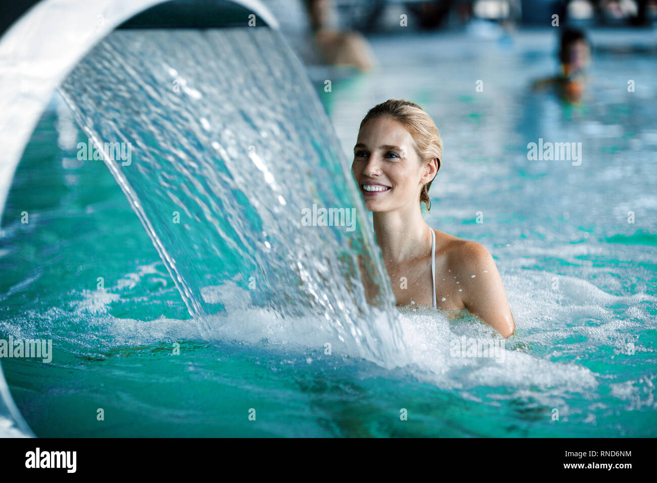 Portrait of beautiful woman relaxing in swimming pool Stock Photo - Alamy