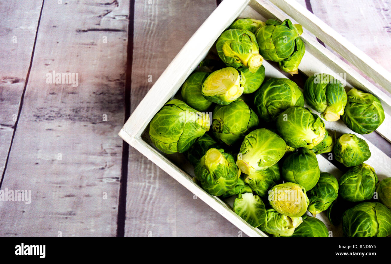 Brussels sprout vegetables on a table top view Stock Photo