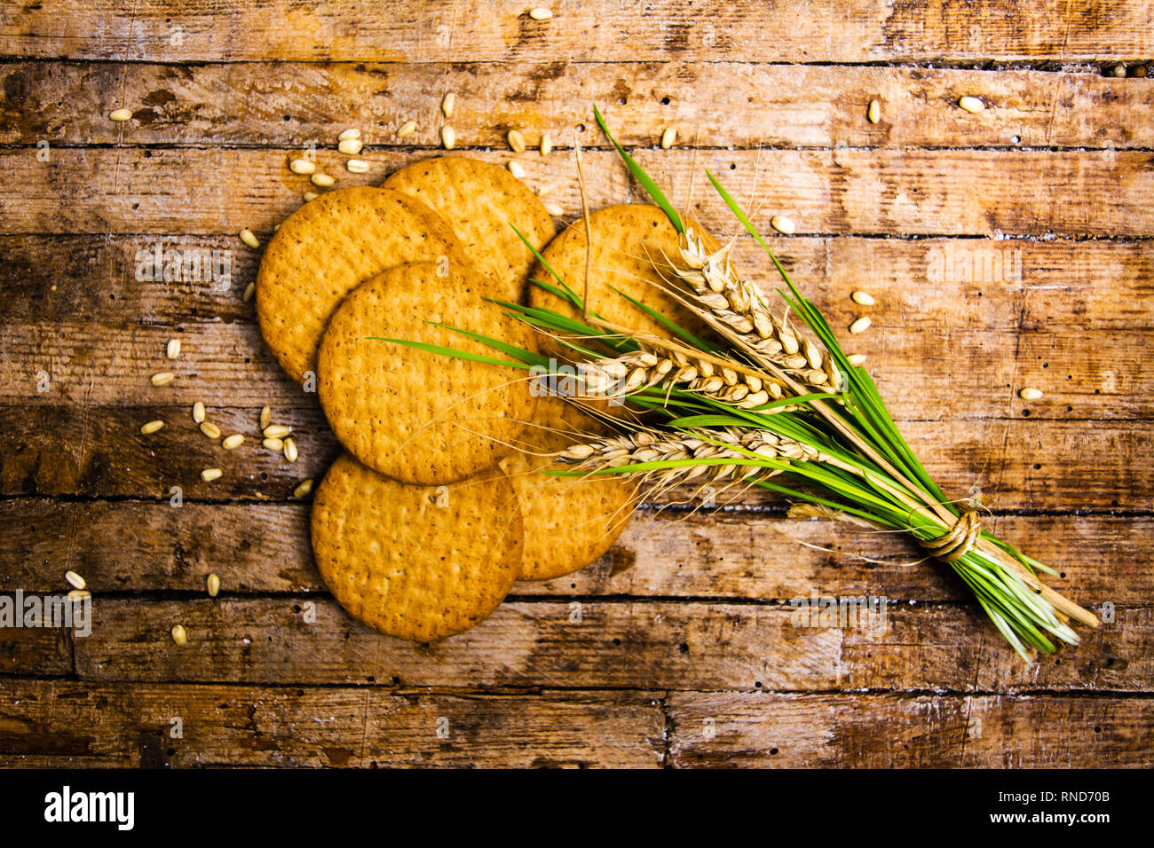 Wheat integral cookies and wheat branch isolated Stock Photo