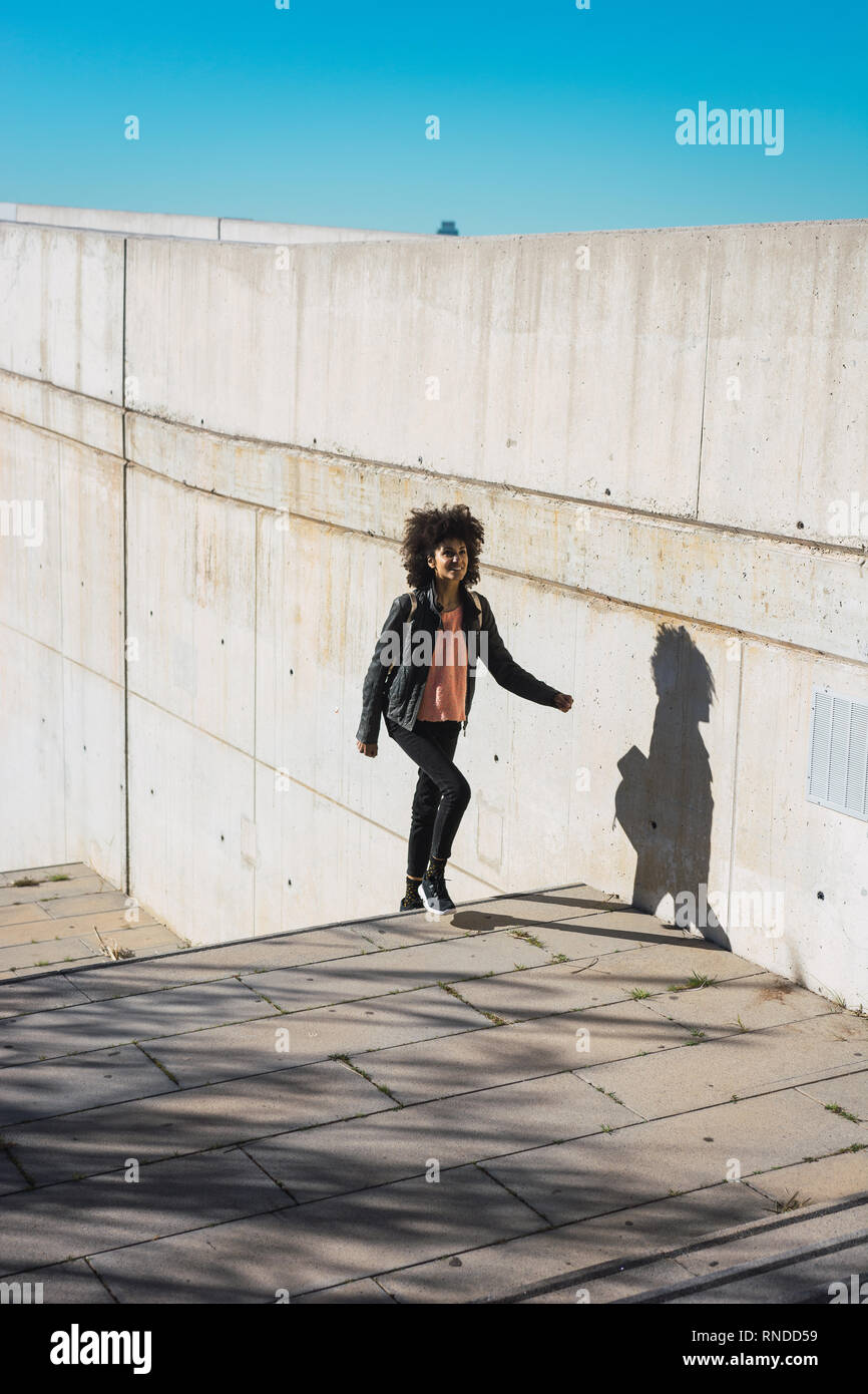 African woman walking hi-res stock photography and images - Alamy