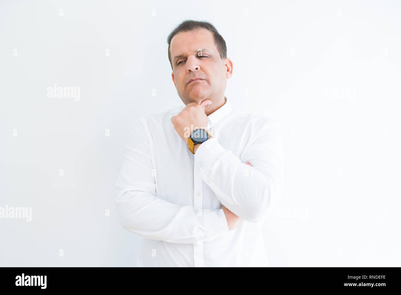 Middle age man thinking clueless about a question Stock Photo