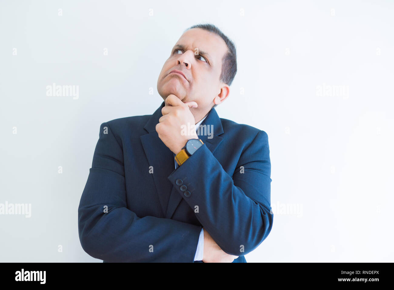 Middle age man thinking clueless about a question Stock Photo
