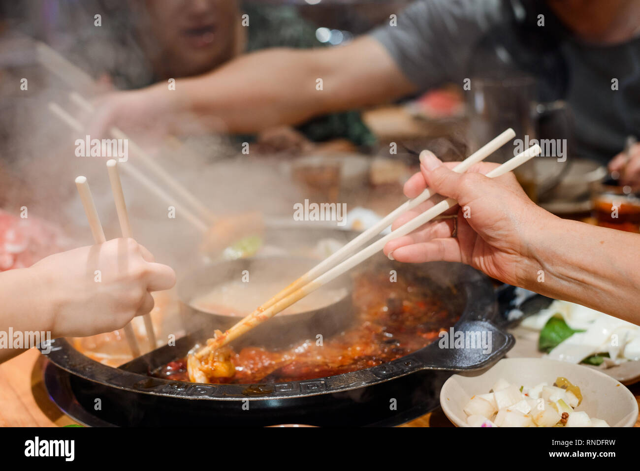 Eating with chopsticks Stock Photo Alamy