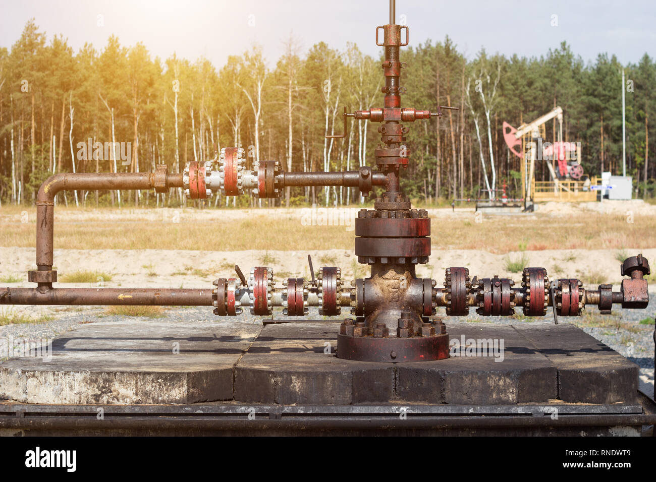 Equipment for oil and gas production, in the background a well that