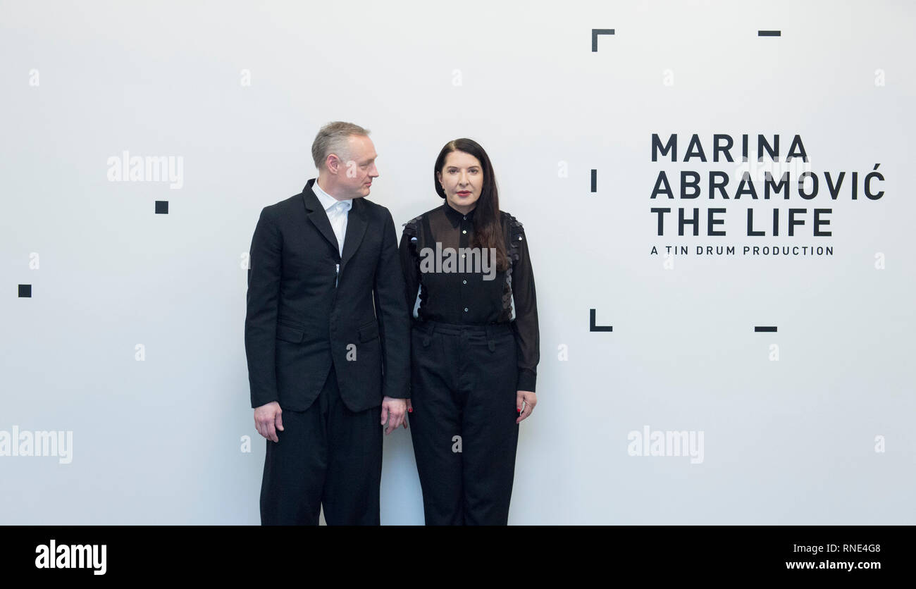 Serpentine Gallery, London, UK. 18 February, 2019. Art and technology combine for a world first with Marina Abramović, the pioneering performance artist, and the presentation of her latest performance: The Life in Mixed Reality (a wearable augmented experience watched by visitors with electronic glasses). Image: The Artist Marina Abramović (right) with Todd Eckert, founder of Tin Drum, a technology collective and producers of The Life. Credit: Malcolm Park/Alamy Live News. Stock Photo