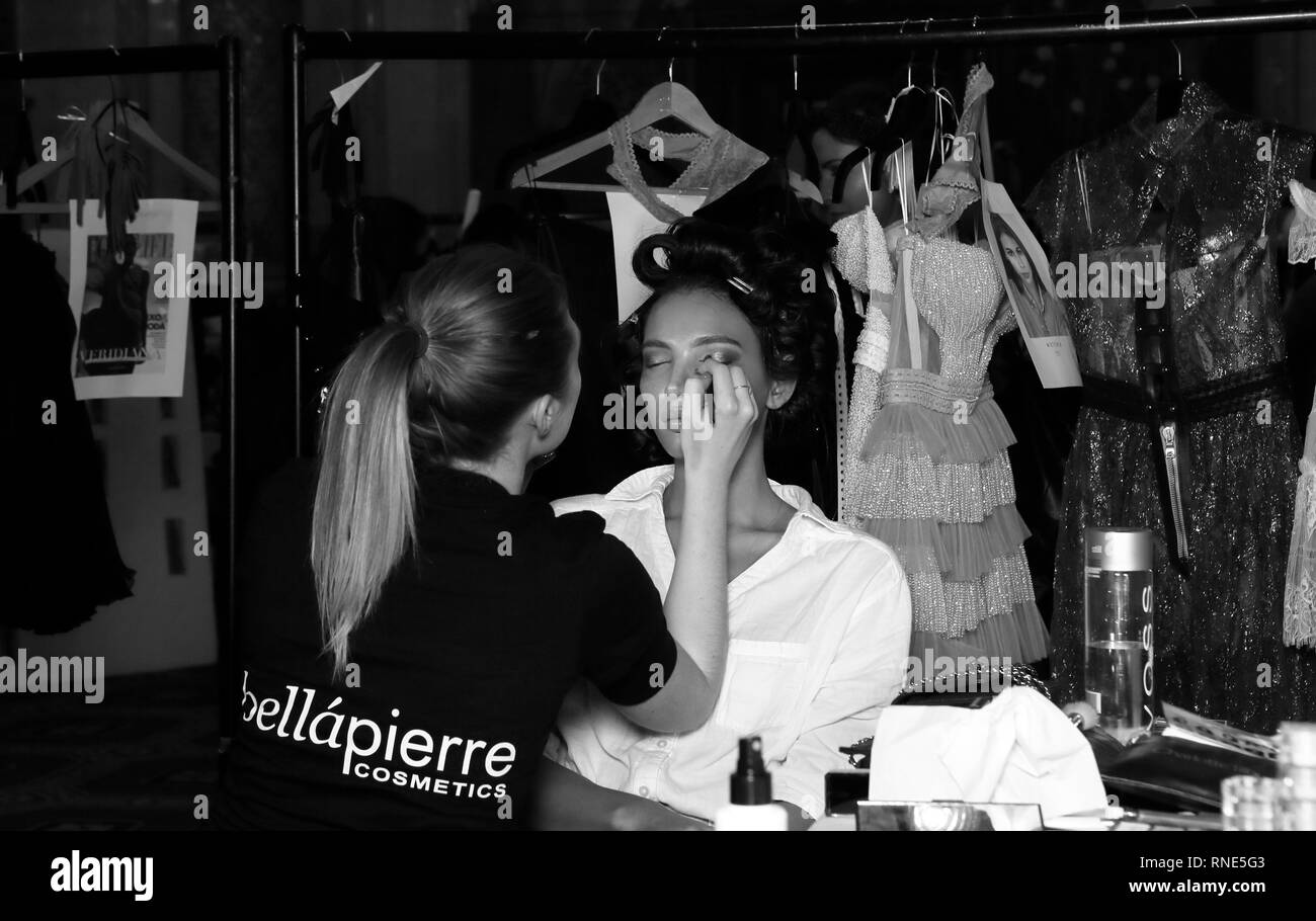 London, UK. 17th Feb, 2019. A model in hair and make up backstage ahead of the Kristian Aadnevik show during London Fashion Week Autumn/Winter 2019 on February 17, 2019 in London, United Kingdom. Photo by Paul Cunningham Credit: Paul Cunningham/Alamy Live News Credit: Paul Cunningham/Alamy Live News Stock Photo