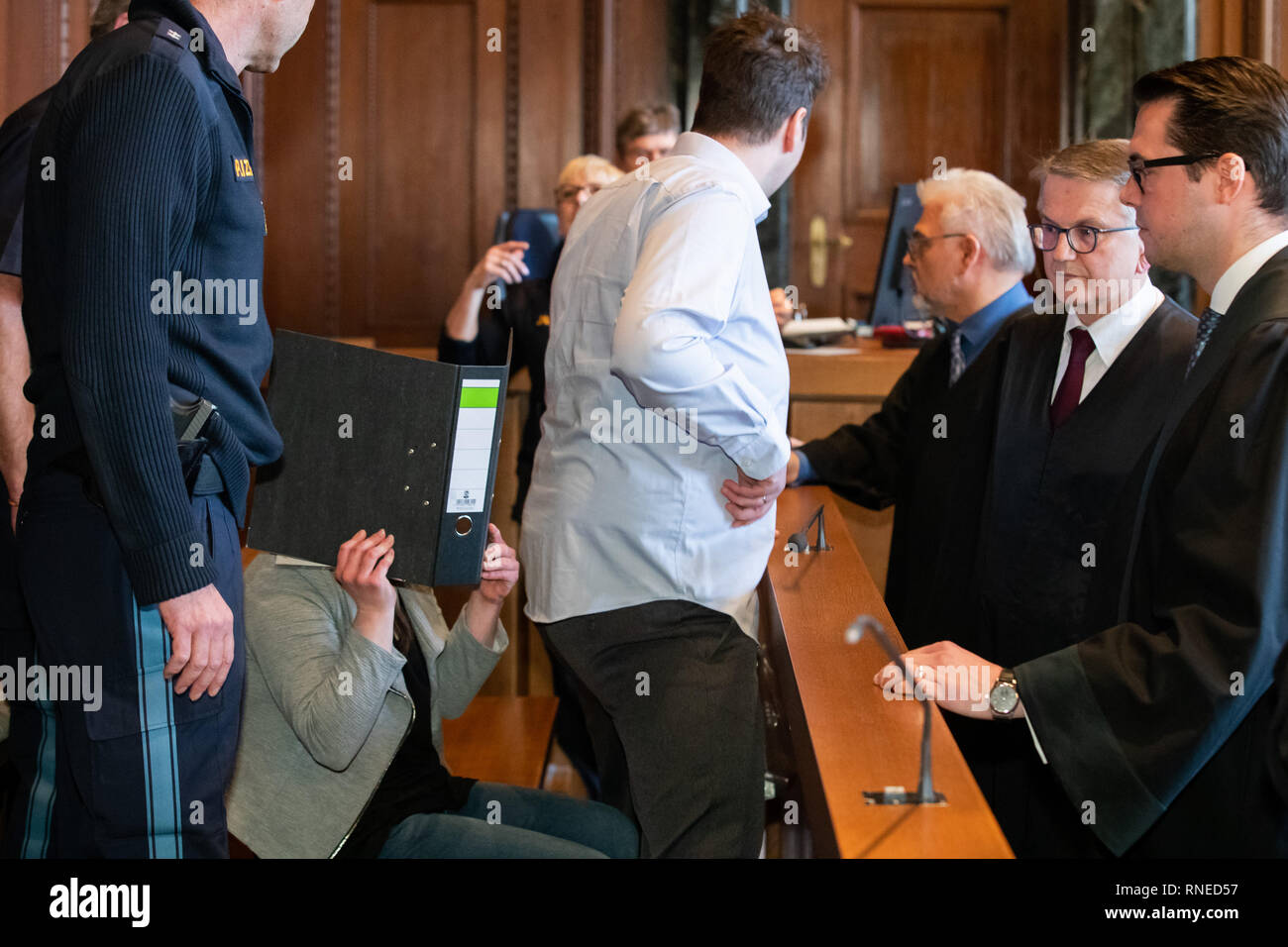 19 February 2019, Bavaria, Nürnberg: A 26-year-old man (centre right ...