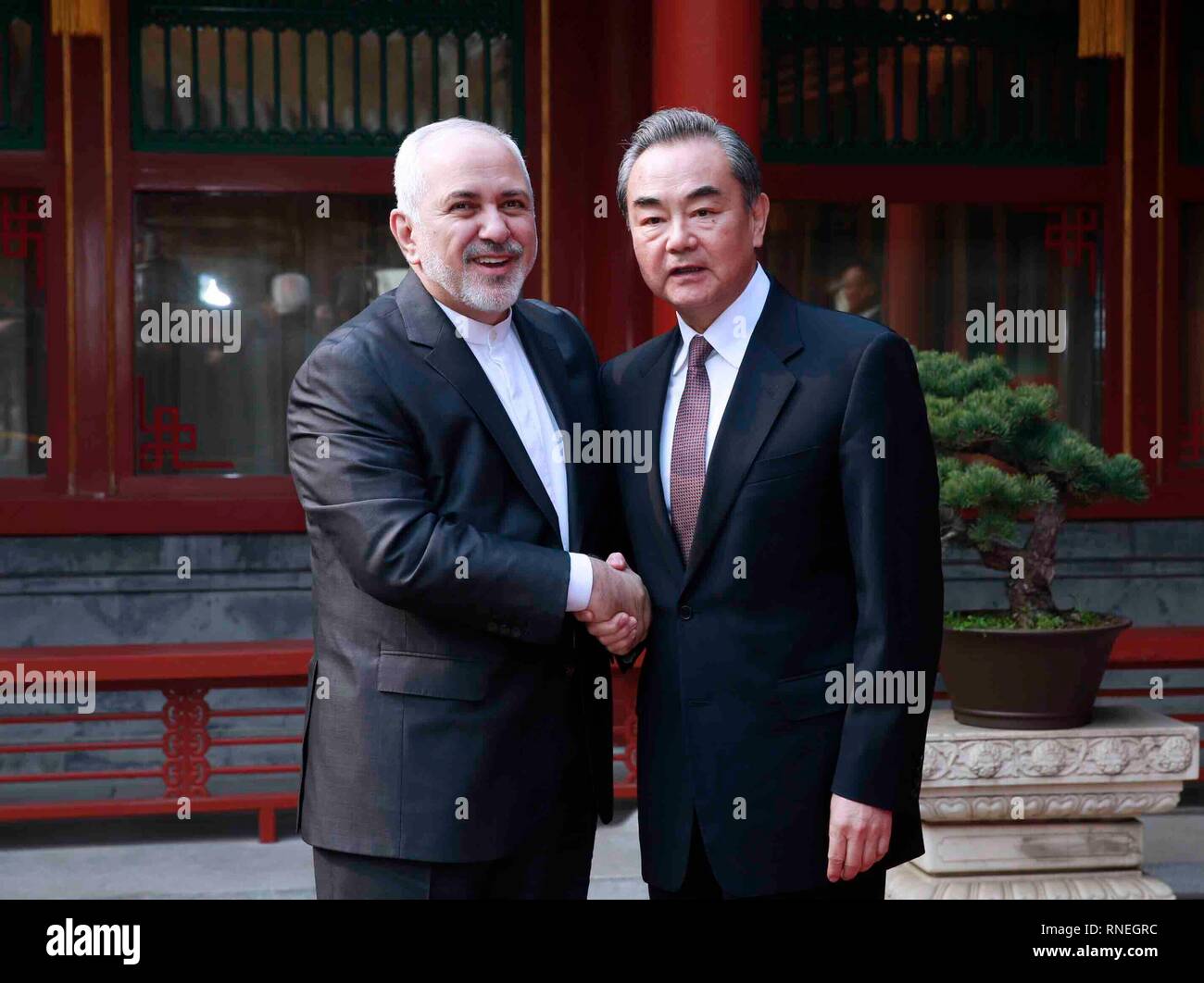 Beijing, China. 19th Feb, 2019. Chinese State Councilor and Foreign Minister Wang Yi (R) meets with Iranian Foreign Minister Mohammad Javad Zarif, who is accompanying Iranian Parliament Speaker Ali Larijani on a visit to China, in Beijing, capital of China, Feb. 19, 2019. Credit: Liu Bin/Xinhua/Alamy Live News Stock Photo