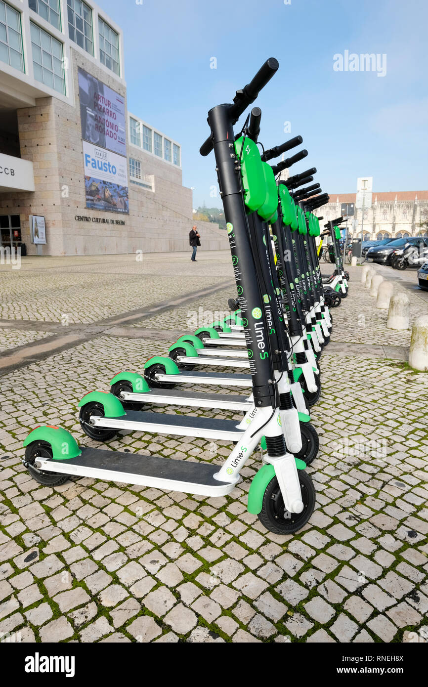 Lime Lime-S dockless electric scooters for hire in Lisbon, Portugal Stock Photo