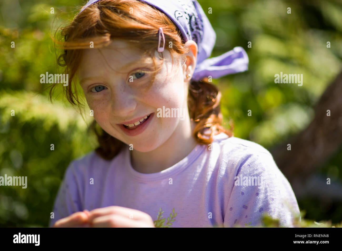 Portrait of a young girl in a forest Stock Photo - Alamy