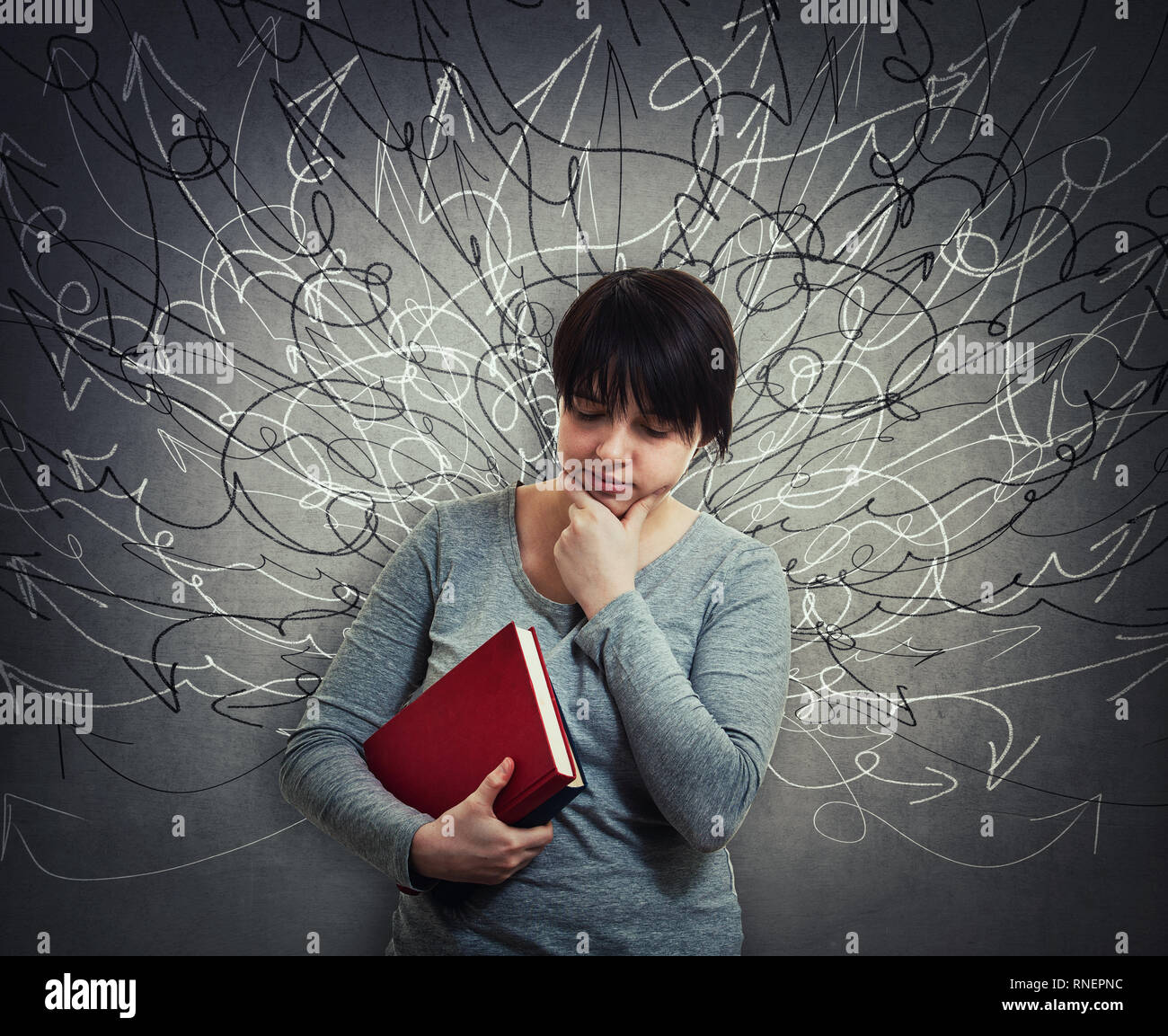Upset pensive woman student holding books, thinking eyes closed. Sad emotion, unhappy feeling, difficult task to solve. Hundreds of arrows and curves  Stock Photo