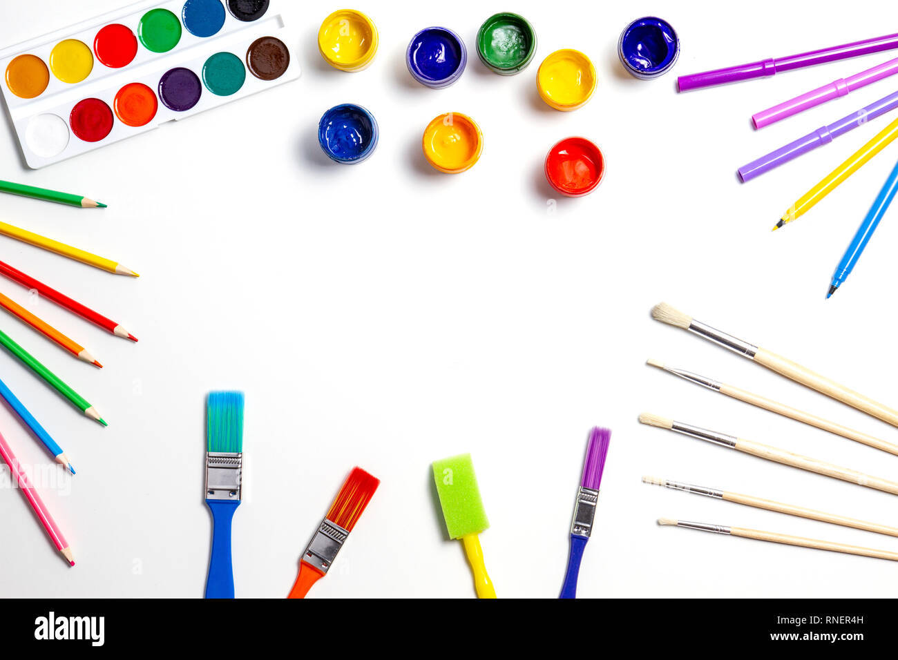 Creative background with art supplies on white background Stock Photo