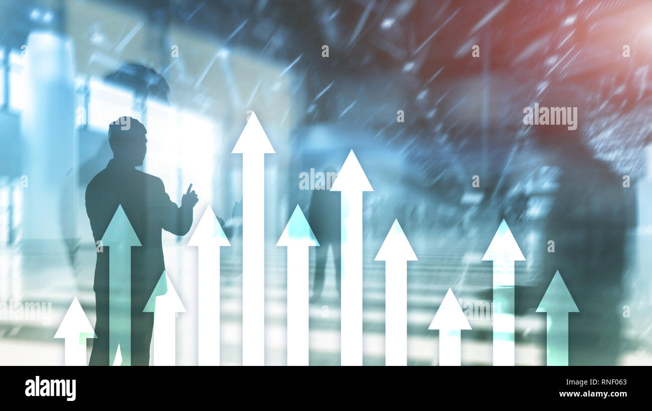 Up arrow graph on skyscraper background. Invesment and financial growth concept. Stock Photo