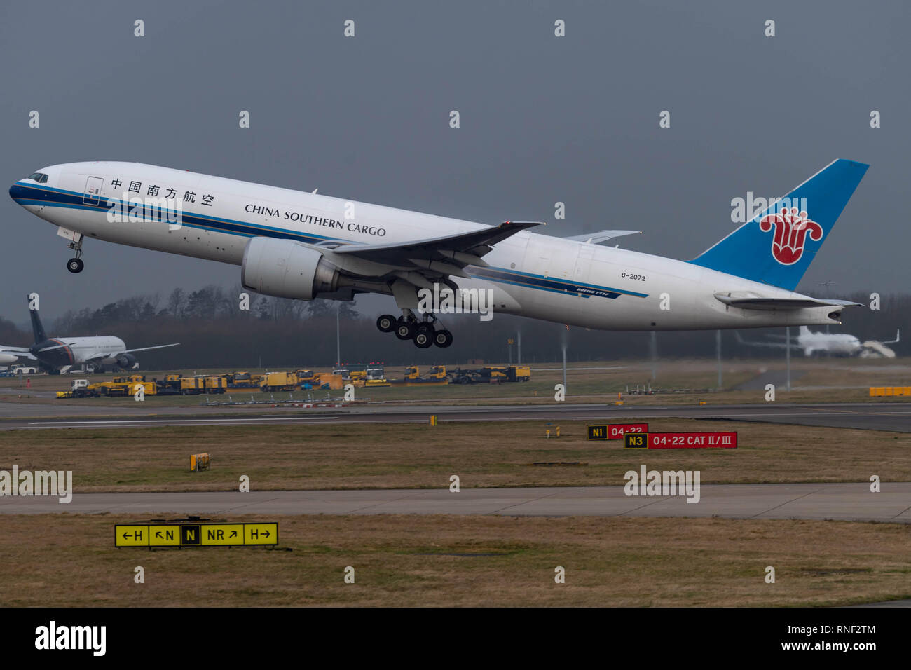Stansted Airport comerercial aircraft China Southern Airlines cargo Boeing 777 takes off Stock Photo