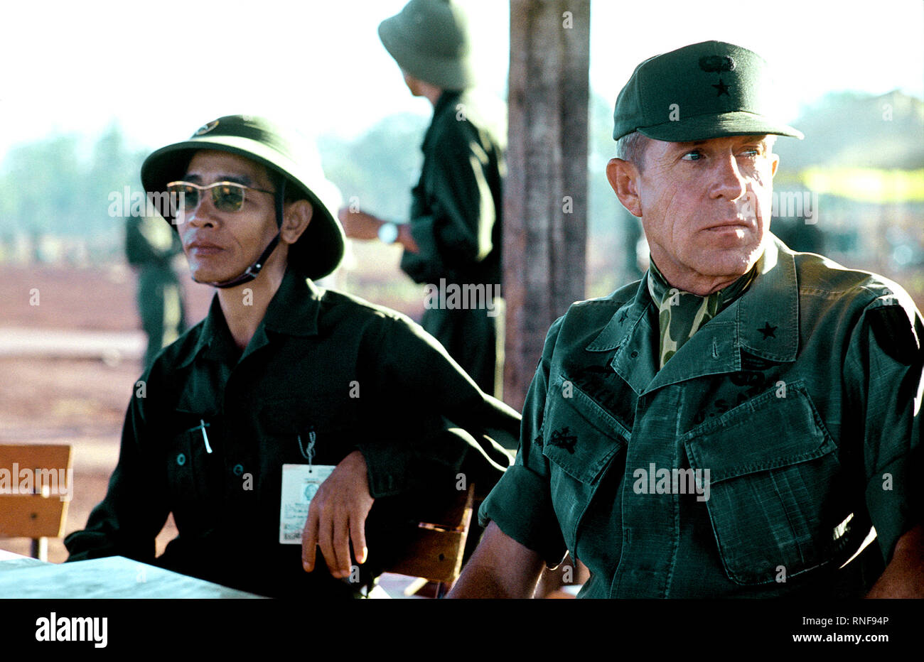 BGEN Stan McClellan, U.S. Army, Chief of Staff, Military Assistance Command - Vietnam (MACV)  discusses the pending exchange of American and South Vietnamese prisoners for Viet Cong (VC) and North Vietnamese (NVA)prisoners with Viet Cong officer. Stock Photo