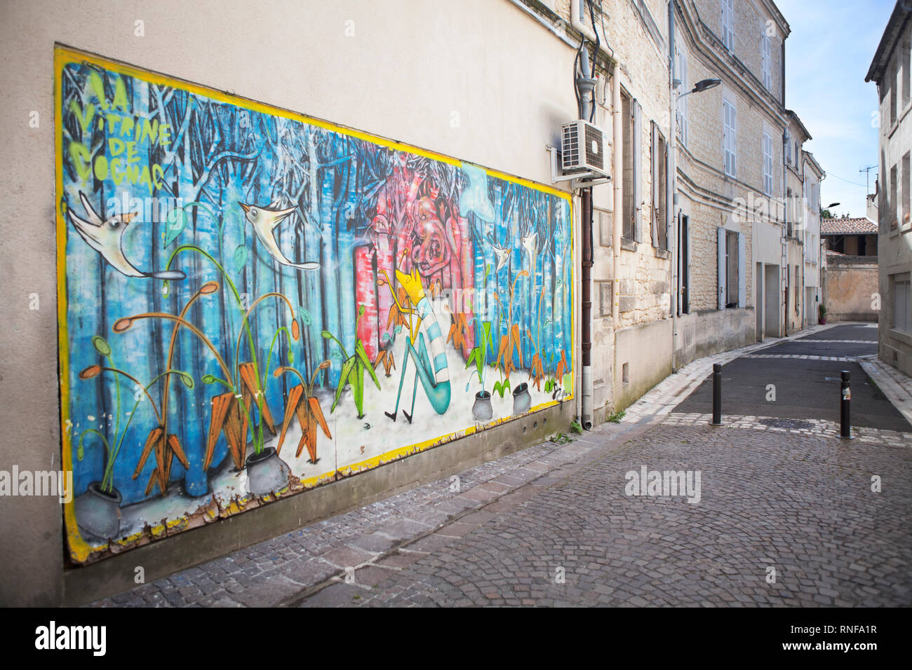 A colourful piece of street art in the French town of Cognac Stock Photo