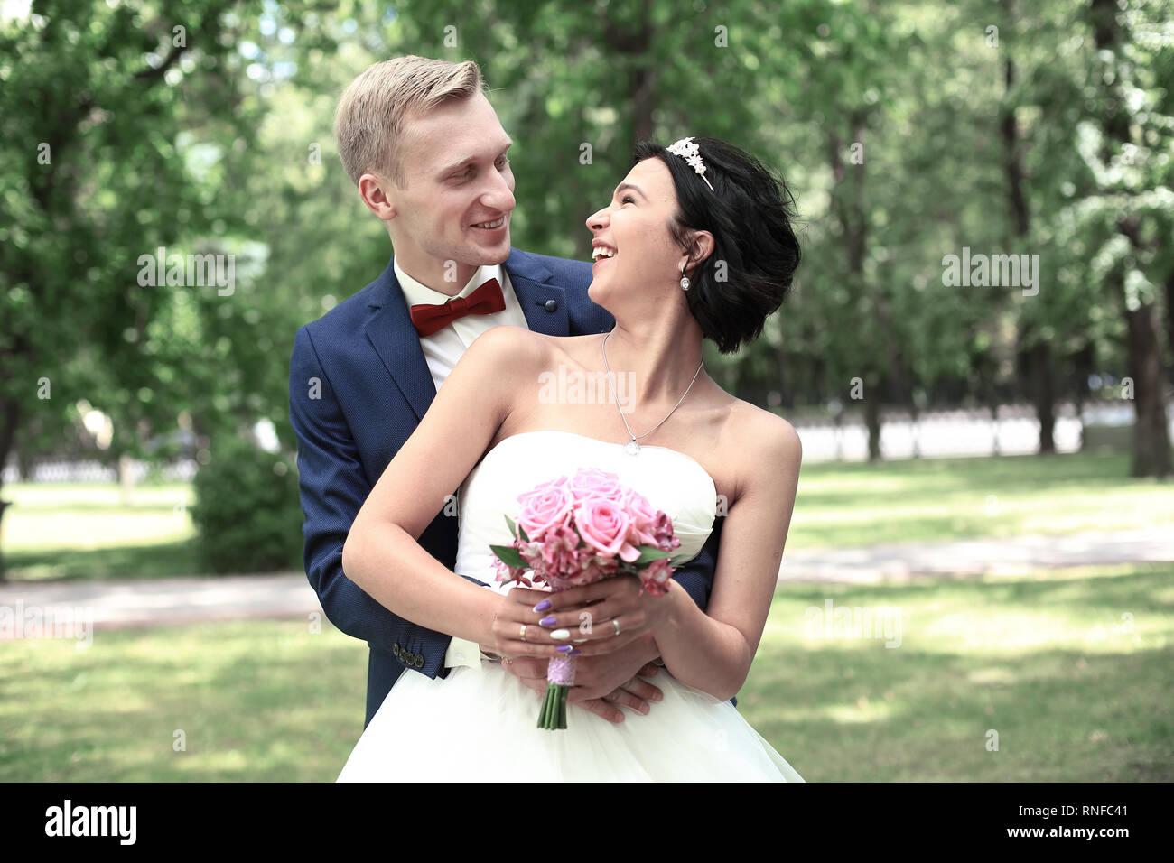 portrait of happy couple on nature background Stock Photo - Alamy