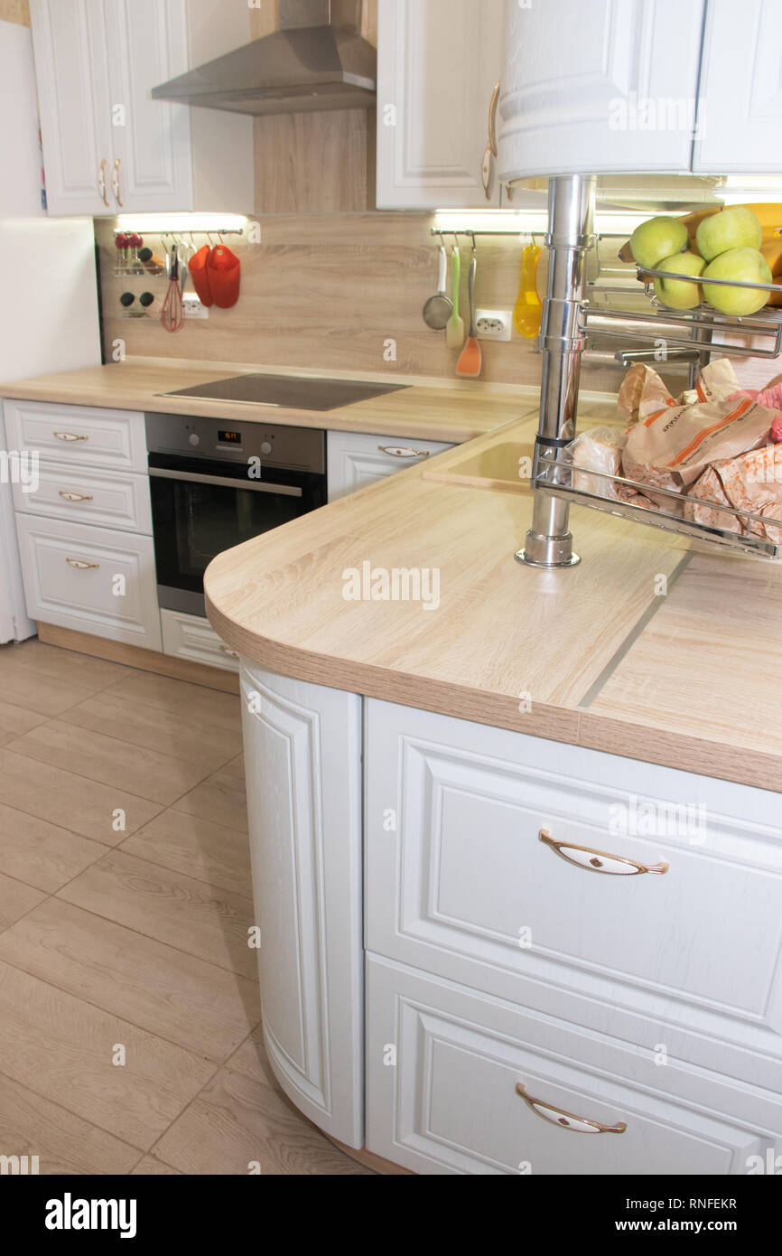 White modern kitchen from solid oak. Modern kitchen. White kitchen. Russia, St. Petersburg, Murino February 10 2019 Stock Photo