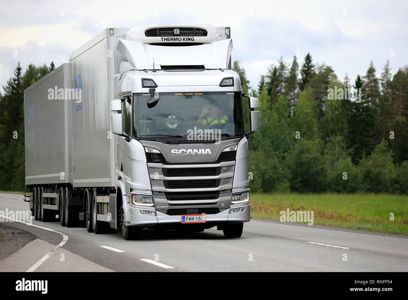 Uurainen, Finland - August 25, 2018: Silver Next generation Scania R650 of Mattila pulls Thermo King refrigerated trailer along highway in the summer. Stock Photo