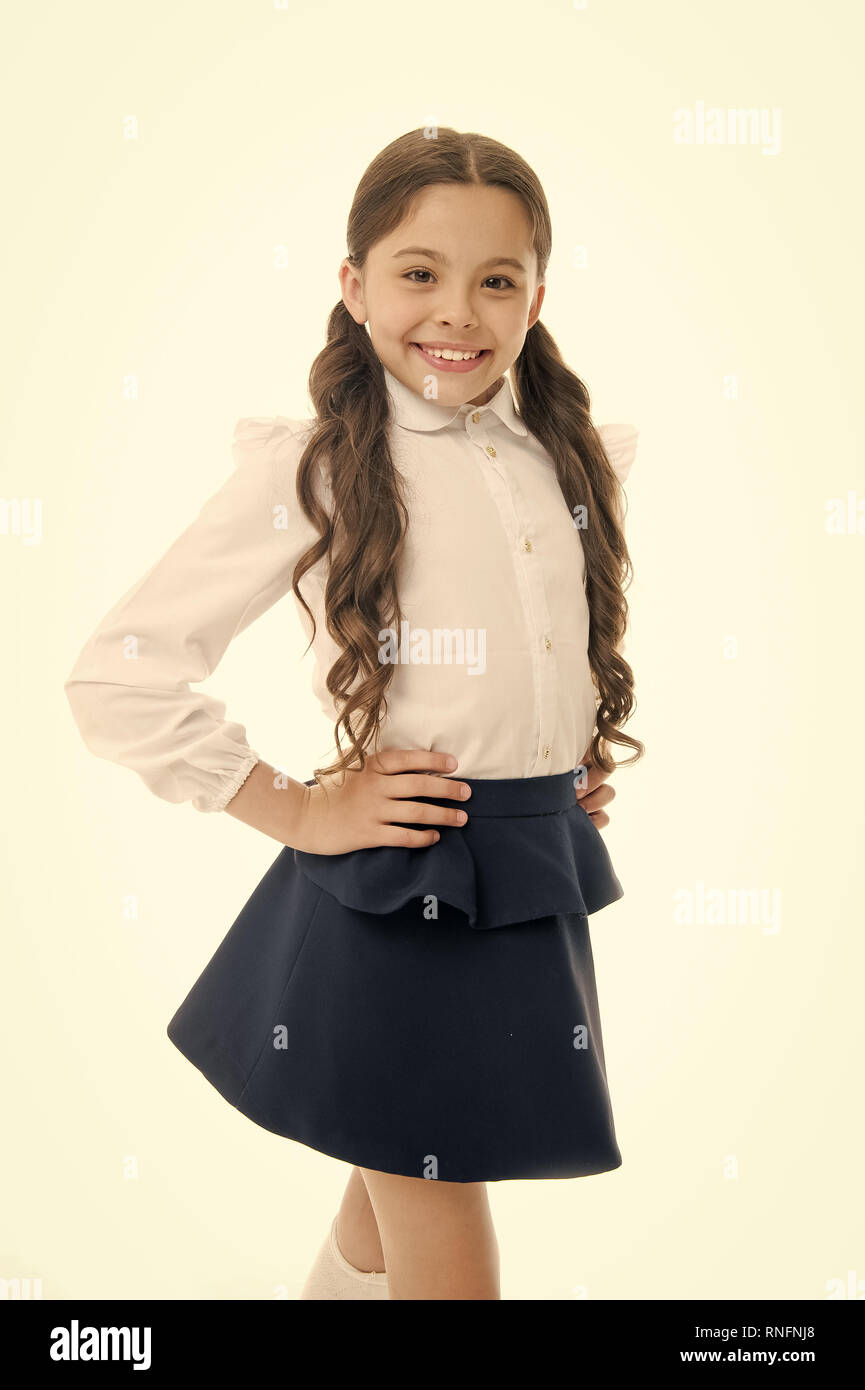 Little girl smile in school uniform isolated on white. Child smiling with  long brunette hair. Fashion kid with stylish look. Beauty salon. Happy hair,  happy you Stock Photo - Alamy