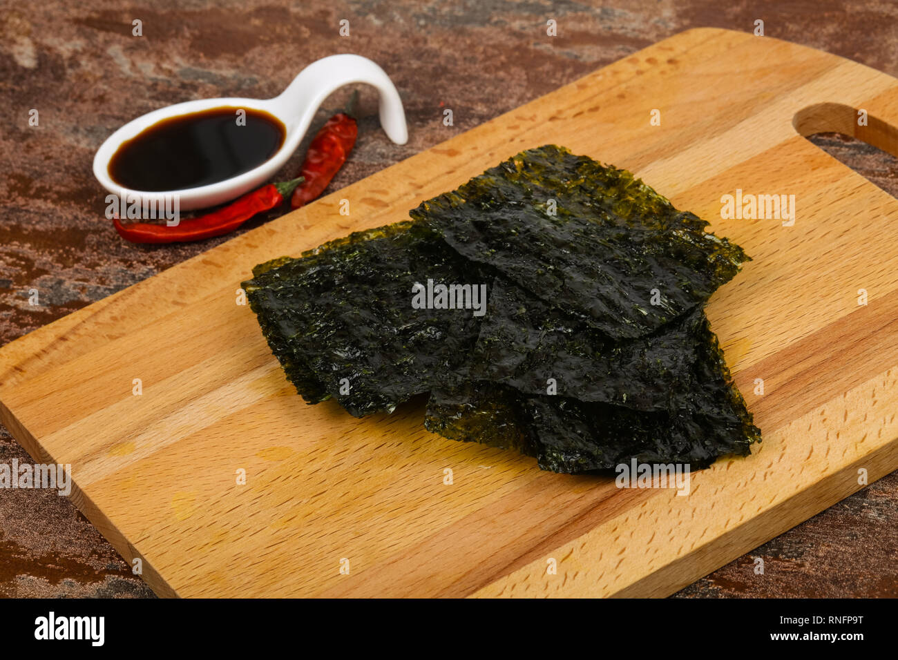 Tasty Nori chips with soya sauce Stock Photo Alamy