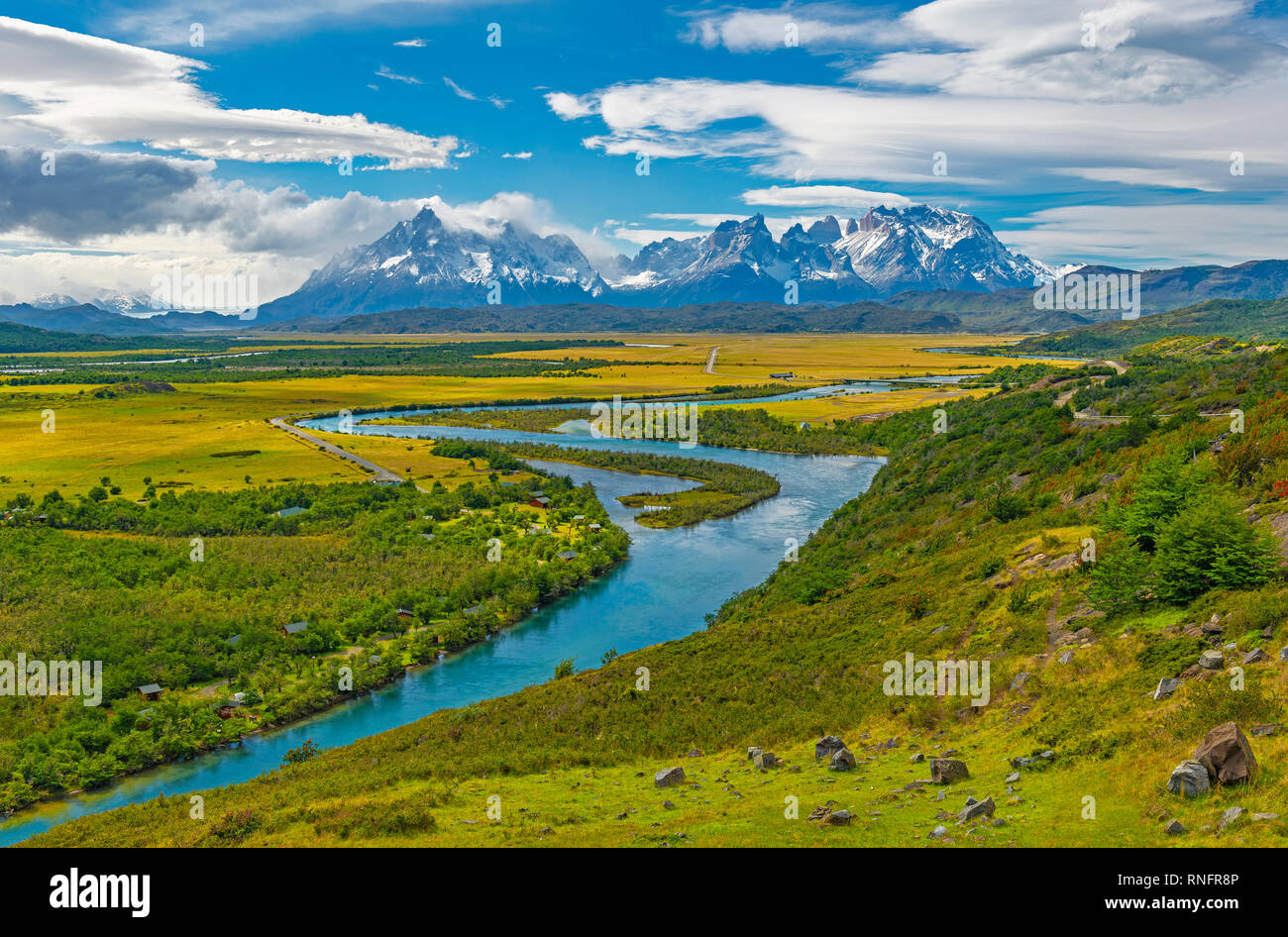 The majestic peaks of the Cuernos and Torres del Paine in summer, the turquoise Serrano river, Torres del Paine national park, Puerto Natales, Chile. Stock Photo