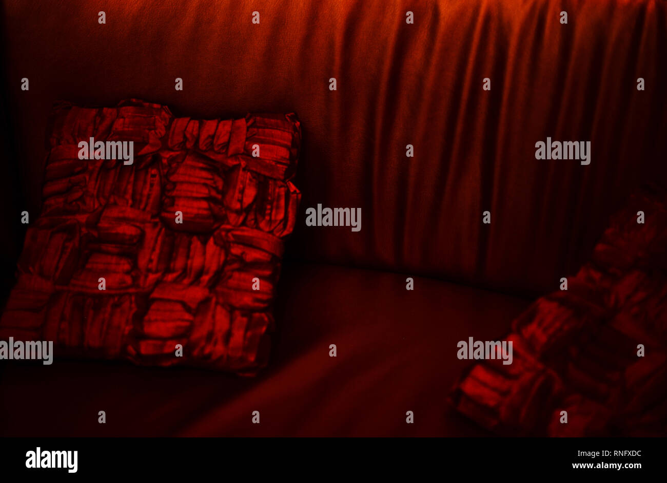 background velvet elegant and stylish. red velvet sofa. Stock Photo