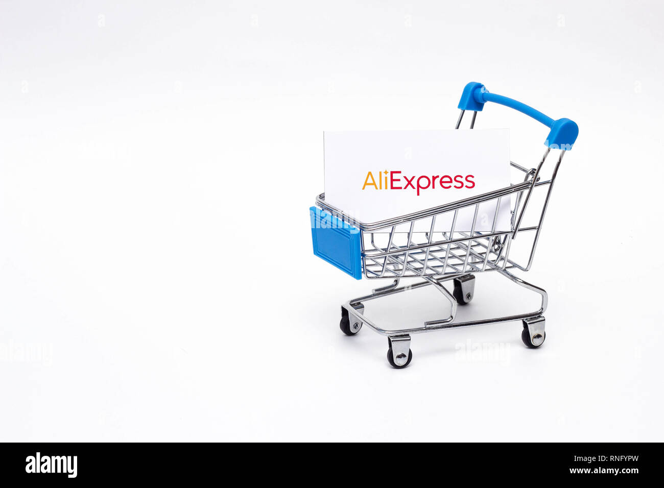 Shopee is e-commerce technology company. Smartphone with Shopee logo on the  screen, shopping cart and parcels Stock Photo - Alamy