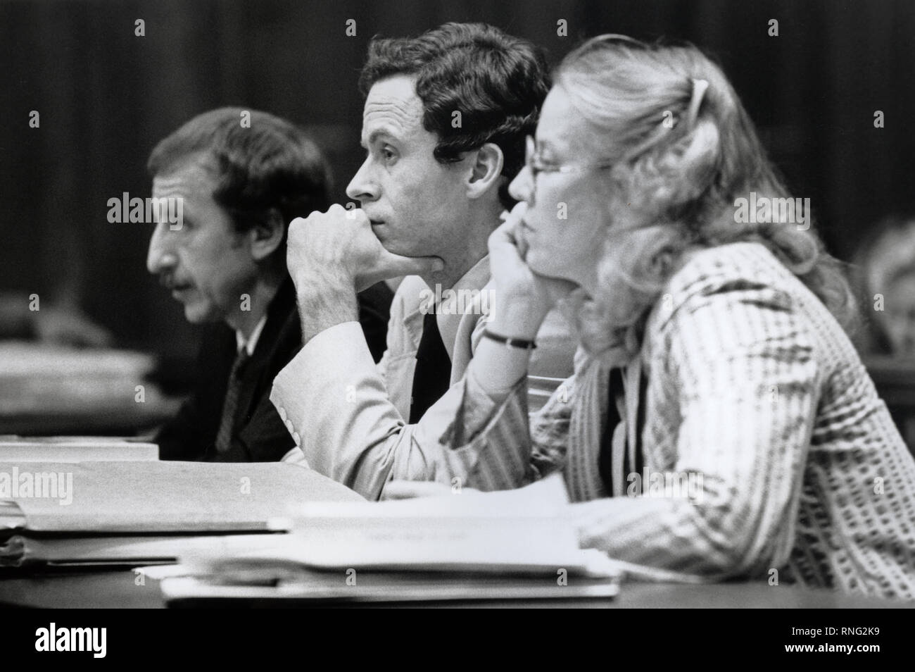 Ted Bundy Murder Trial - Miami - Ted Bundy with defense attorney Margaret Good (right) and Public Defender Michael Minerva (left)  at the defense table. Theodore Robert Bundy was an American serial killer, kidnapper, rapist, burglar, and necrophile who assaulted and murdered numerous young women and girls during the 1970s and possibly earlier. After more than a decade of denials, he confessed to 30 homicides that he committed in seven states between 1974 and 1978. Stock Photo