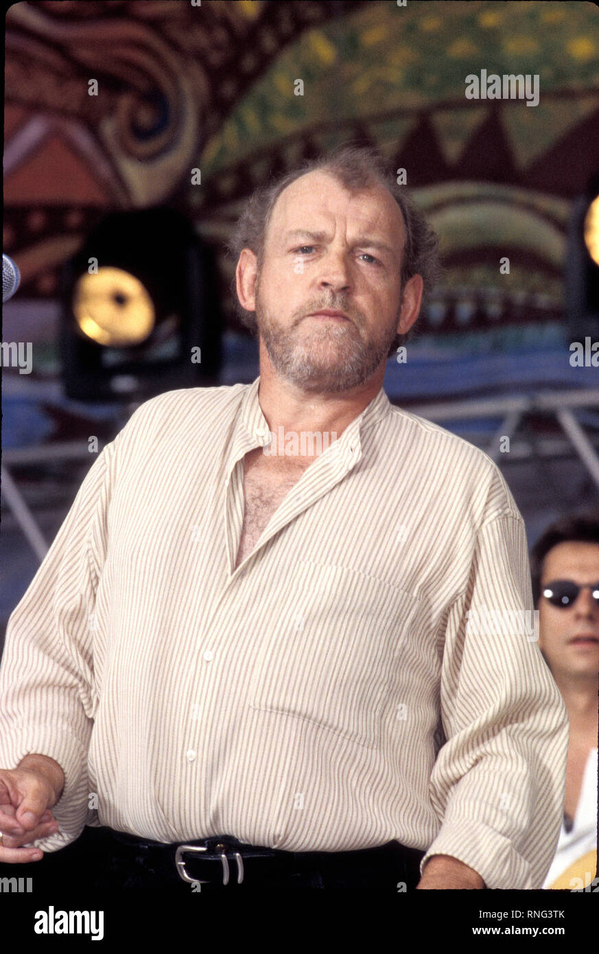 English rock and blues singer Joe Cocker is shown on stage