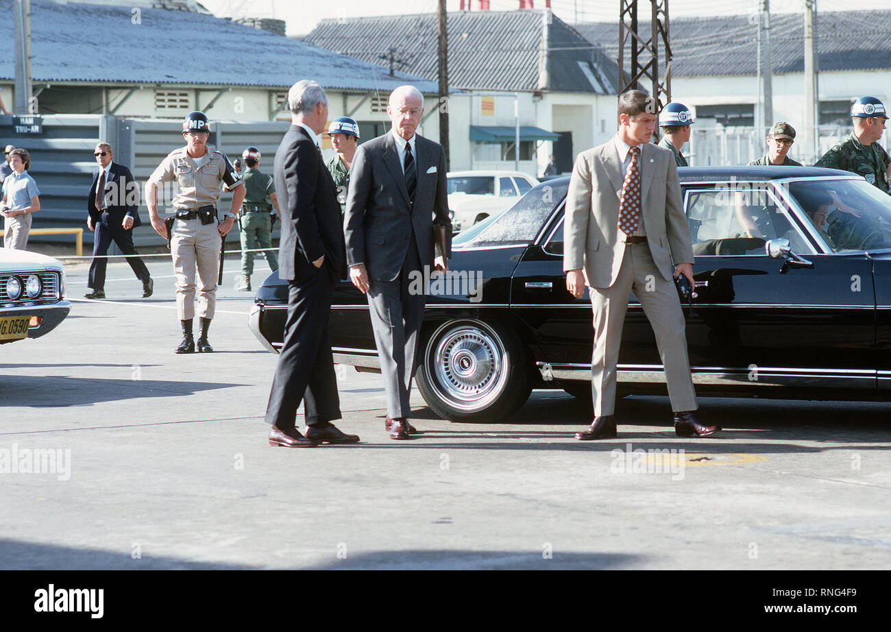 U.S. Ambassador Ellsworth Bunker arrives at Tan Son Nhut Air Base in his automobile to observe the departure of Viet Cong POWs for Loc Ninh prisoner exchange between the United States/South Vietnam and North Vietnam/Viet Cong militaries. Stock Photo