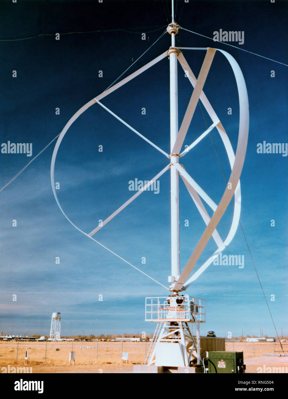 A view of a vertical axis wind turbine of the Darrieus design.  This machine is 17 meters high and produces up to 150 kilowatts of wind power. Stock Photo