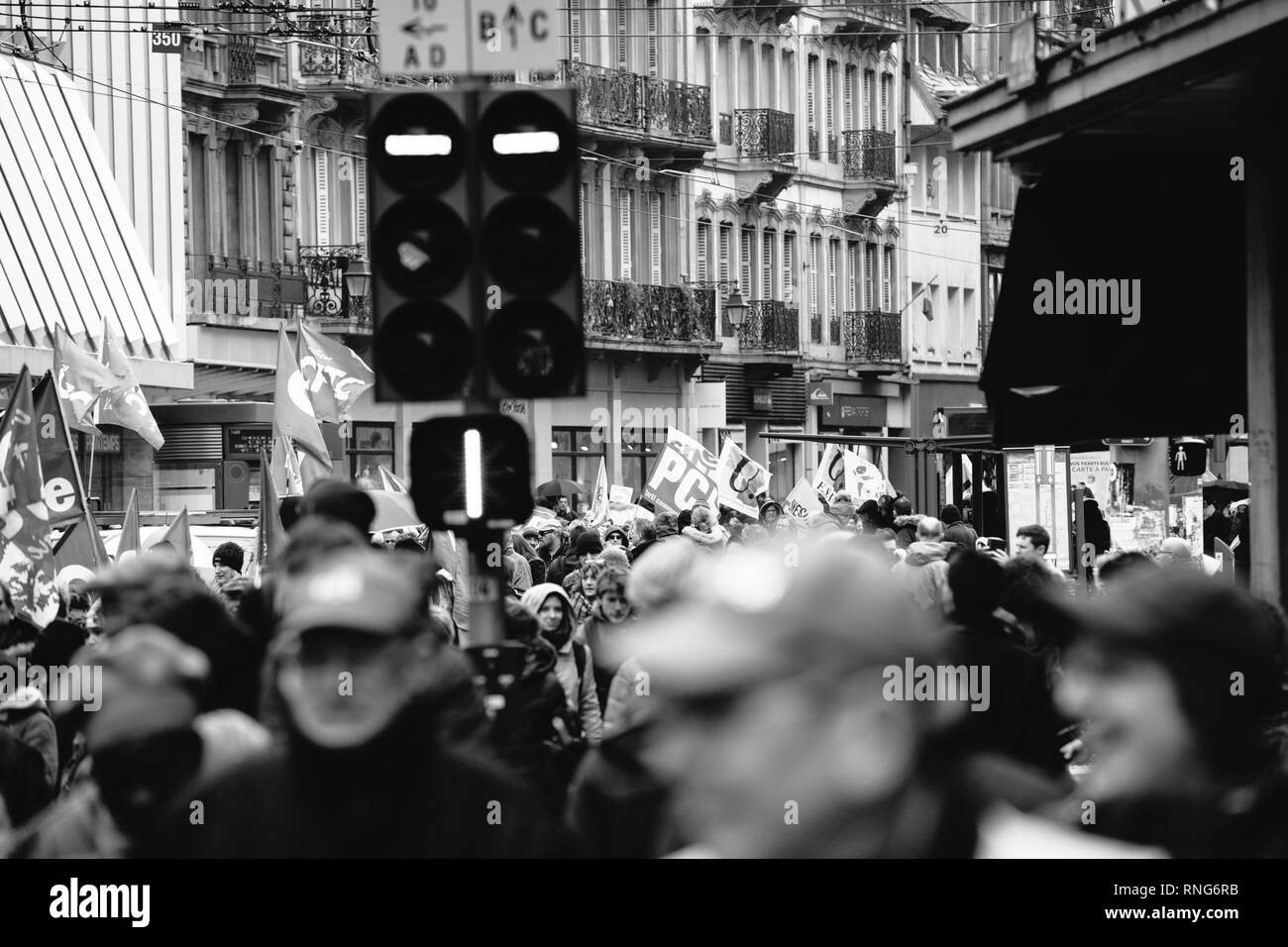 STRASBOURG, FRANCE - MAR 22, 2018: CGT General Confederation of Labour workers with placard at demonstration protest against Macron French government string of reforms - black and white of protestors Stock Photo