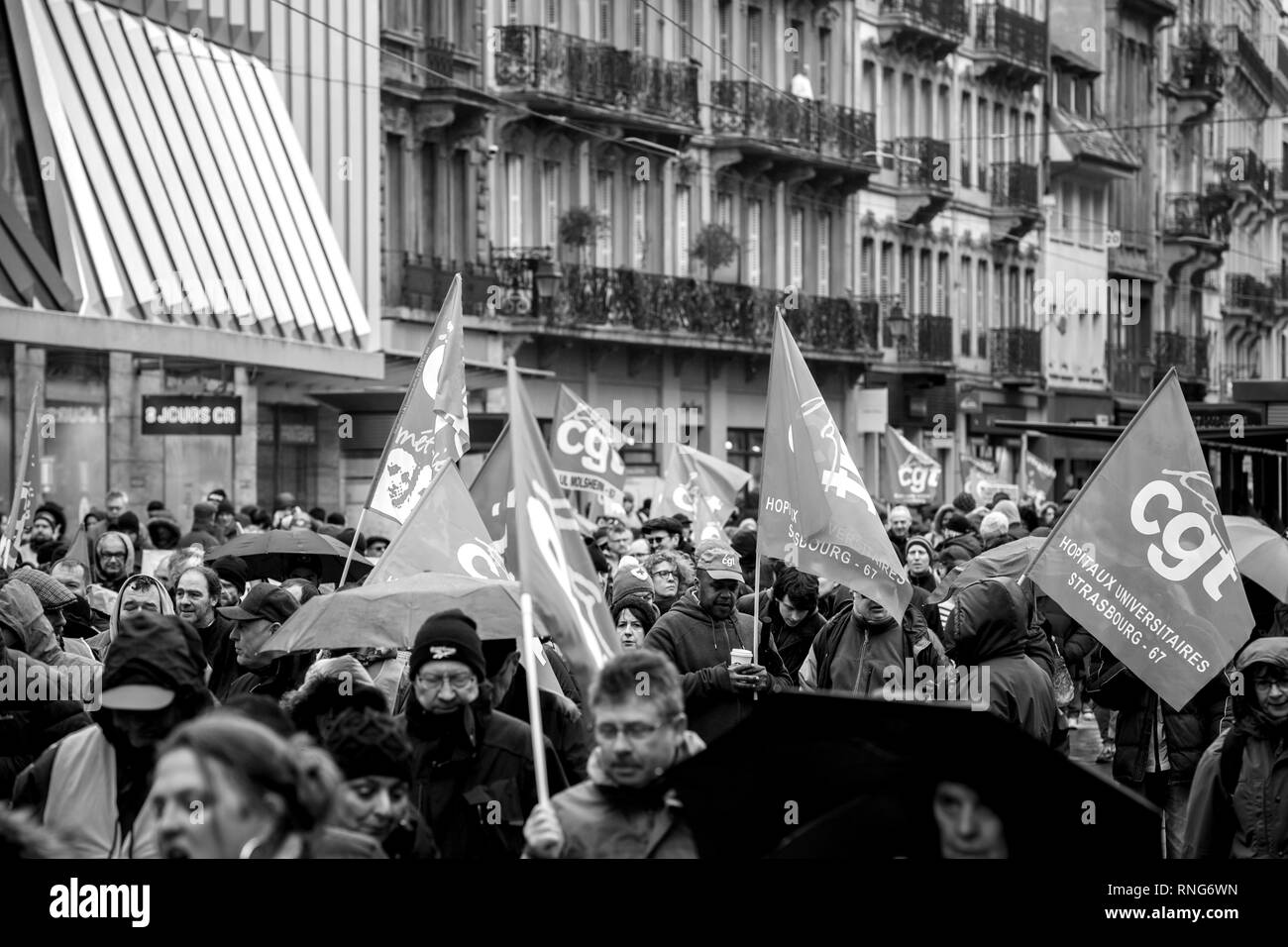 STRASBOURG, FRANCE - MAR 22, 2018: CGT General Confederation of Labour workers with placard at demonstration protest against Macron French government string of reforms - black and white  Stock Photo