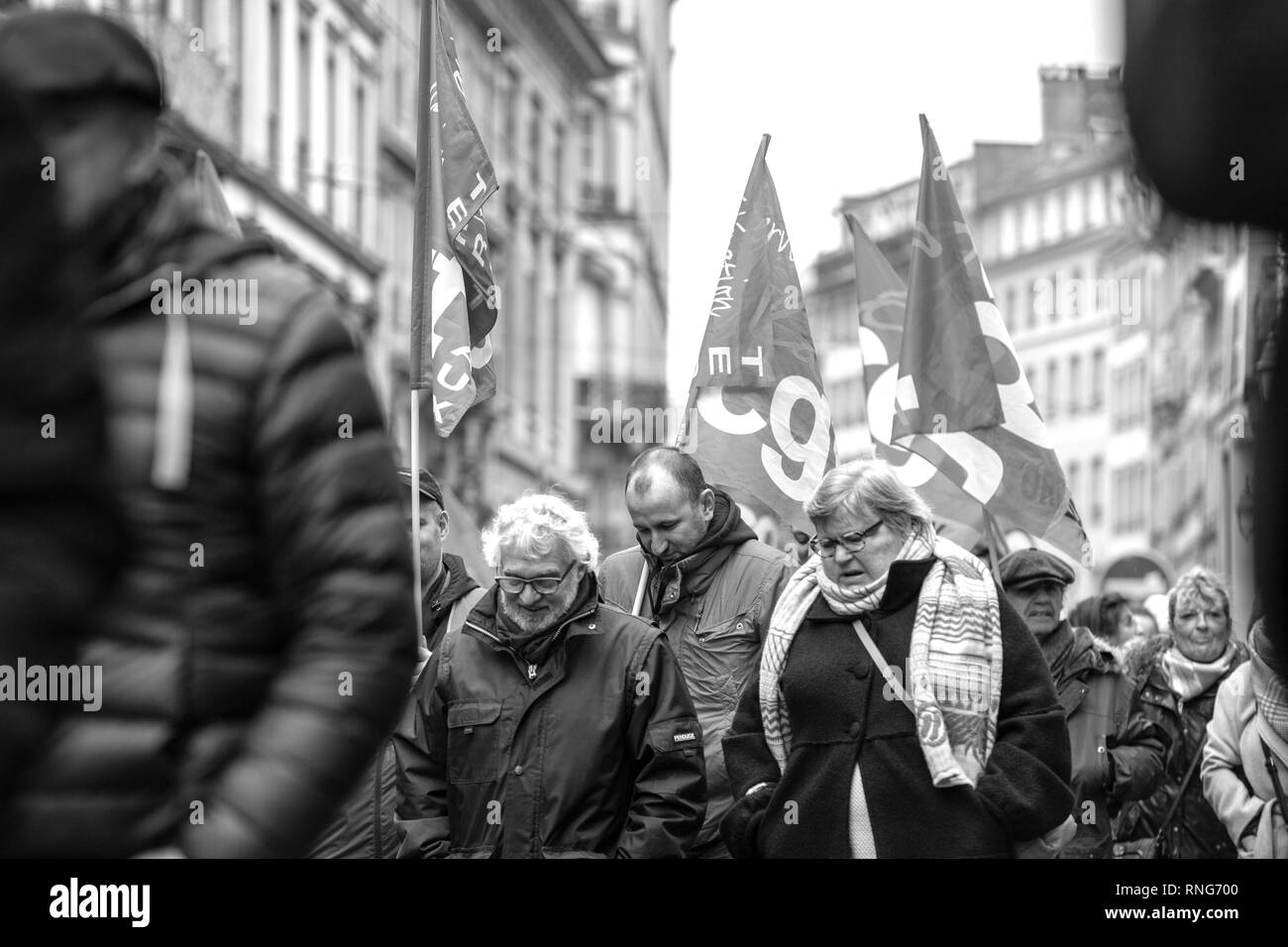 STRASBOURG, FRANCE - MAR 22, 2018: CGT General Confederation of Labour workers with placard at demonstration protest against Macron French government string of reforms - seniors in front of first row of protesters Stock Photo