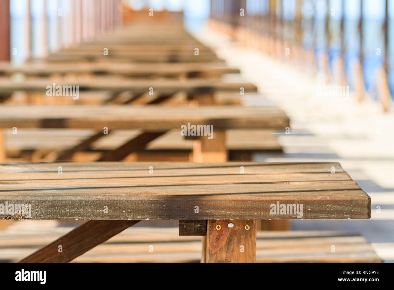 benches and tables in perspective Stock Photo