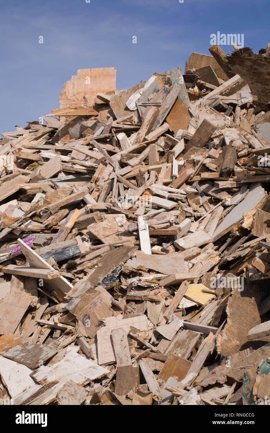 Pile of discarded wooden debris in a recycling yard Stock Photo Alamy