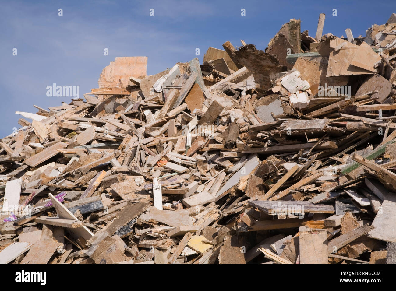 Pile of discarded wooden debris in a recycling yard Stock Photo Alamy
